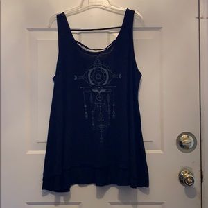 Wound up black tank with laddering in the back